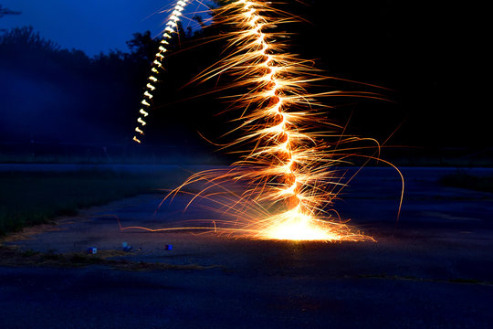 A swirling firework shooting off.