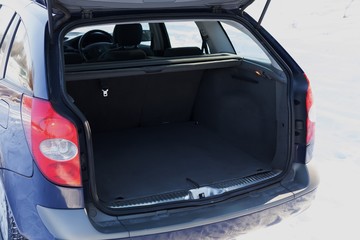 the trunk of a car. open trunk of universal car