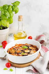 Eggplant casserole with tomato sauce, white cheese, tasty summer stew