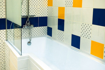 Wash basin modern sink in the bathroom. Chrome-plated water mixer. The mirror above the sink