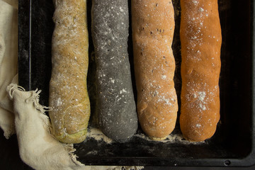 Freshly baked bread on a baking sheet. Vegan bakery. Flat lay. Healthy food concept