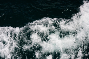 Fototapeta na wymiar Dark blue sea wave texture
