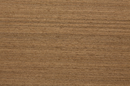 Simple natural teak veneer background in your admirable brown tone.