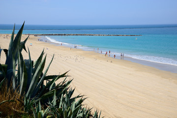 Cádiz, Spain - June 21, 2018: Beach line with bathers in Cadiz.