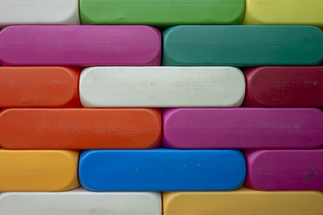 Abstract Background. Background with different colorful shapes plastic blocks . Geometric shapes in different colors.