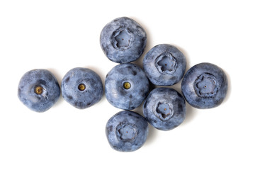 Fresh ripe organic blueberries isolated on white background. Bio bilberry in arrow pointer shape. Healthy diet