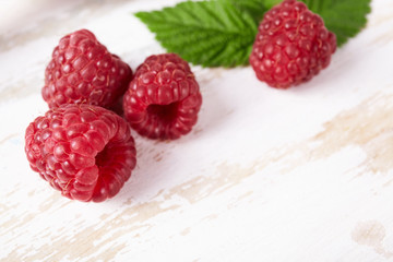 Raspberry with leaves close up