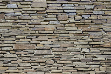 Smooth stonework. Wall of wild stone.