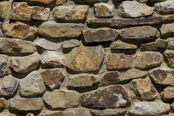 Wall made of wild stone. Texture