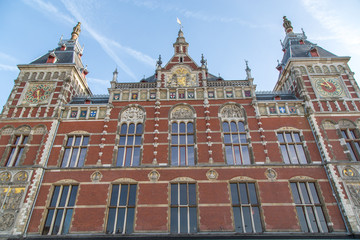 Fototapeta na wymiar Amsterdam Centraal Railway Station, Gothic Renaissance Revival Architecture