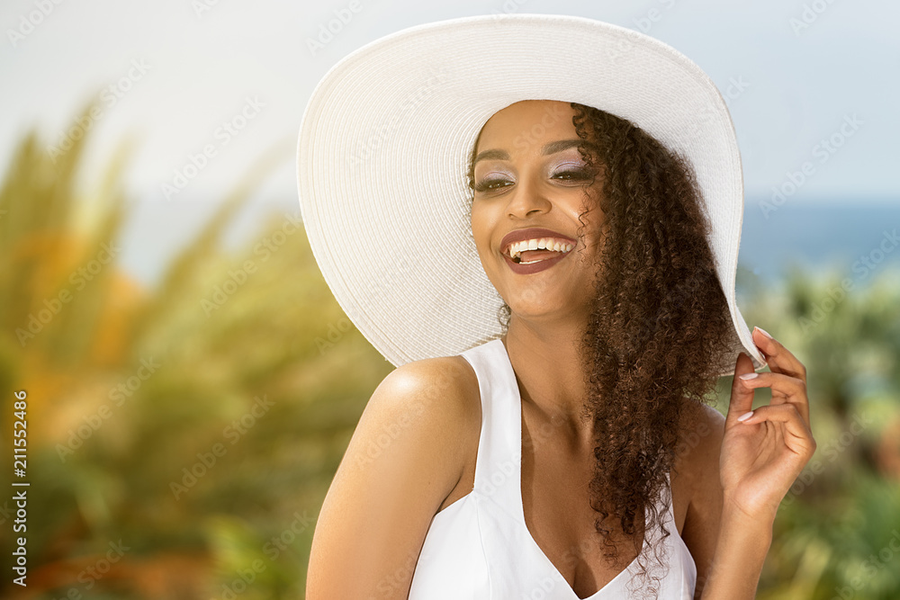 Wall mural beauty african american woman in summer hat.