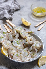 Raw Shrimps on Wooden Skewers