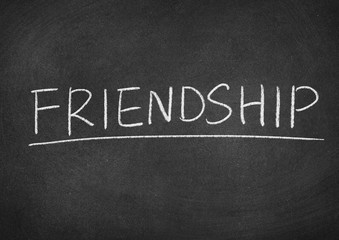 Obraz premium friendship concept word on a blackboard background