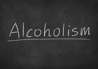 Obraz premium alcoholism concept word on a blackboard background