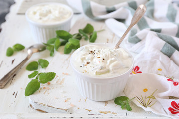 Obraz na płótnie Canvas Summer light salad: Greek yoghurt, garlic, mint and cucumber
