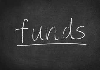 funds concept word on a blackboard background
