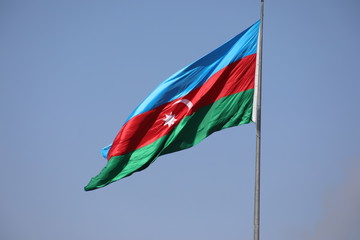 Azerbaijan national flag with Crescent moon. Flags waving wind