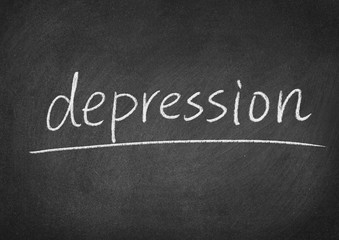 Obraz premium depression concept word on a blackboard background