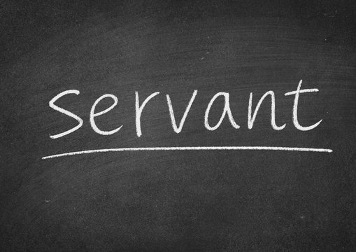 servant concept word on a blackboard background