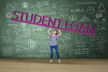 Female college student lifting student loan word