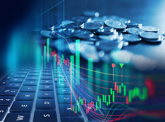 Obraz premium double exposure image of stock market investment graph and coins stack.