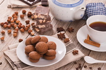 Hazelnut shortbread sandwiches filled with chocolate cream. 