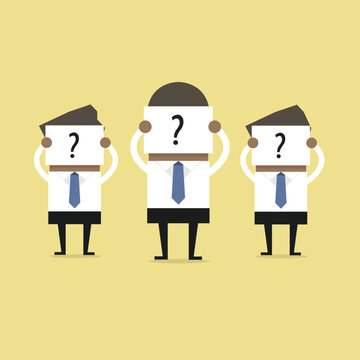 African businessman hold signs with question marks, as yet unable to determine who they are.