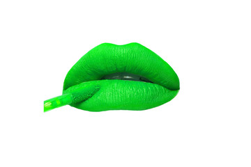 Female lips with lime green matt lipstick close-up on a white background