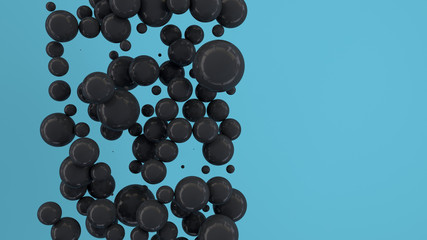 Black spheres of random size on blue background