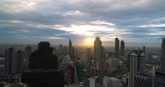 Aerial view of the skyline of Bangkok, Thailand by a beautiful sunset.
