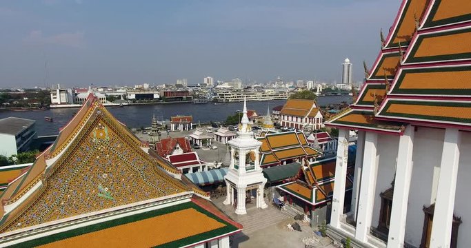 Aerial shot of Wat Kalaya and revealing the Bangkok Skyline.