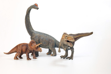 Tyrannosaurus Triceratops Brachiosaurus Dinosaur Toy figurine on white background