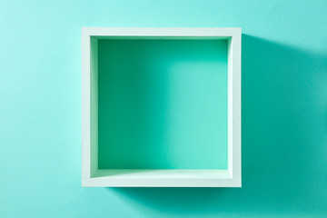 Wall green shelf view isolated on mint background