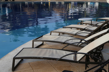 Loungers at the edge of the pool