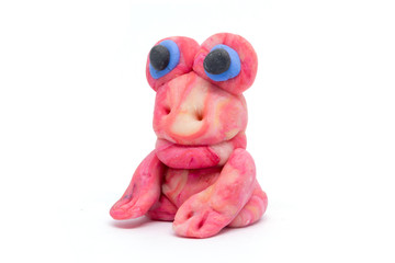 Obraz premium Play dough frog on white background