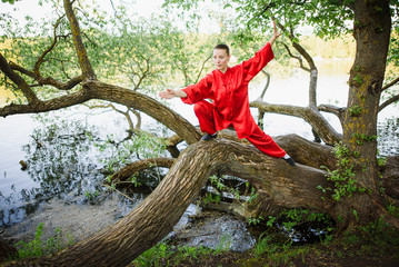 women practicing yoga and tai chi outdoors