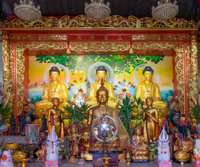 Fototapeta premium Thai and Chinna Statue of Buddha that is believed to happiness and luck placed for people worship.