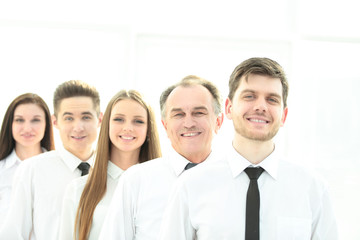 close up.boss and confident business team standing in a row