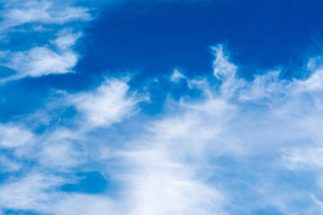 Obraz premium White clouds on the blue sky.