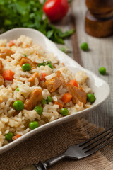 Delicious risotto with chicken and green peas.