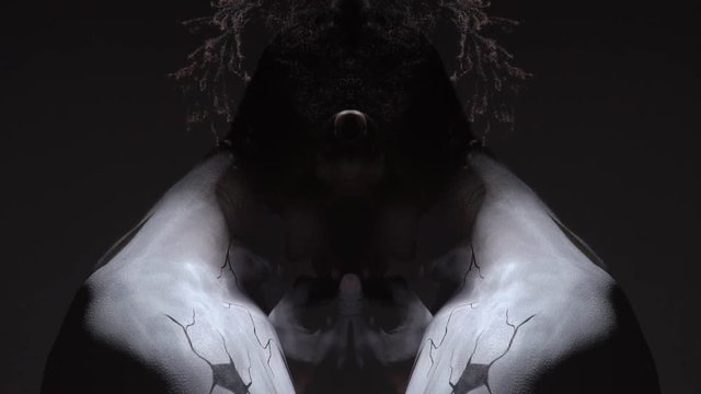 Mounting a clip, body painting on the body of a black guy