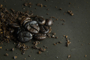 The  coffee roasted on  black texture close up background..