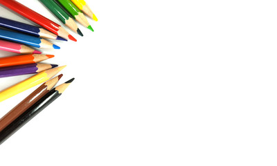 Color pencils on white background, copy space