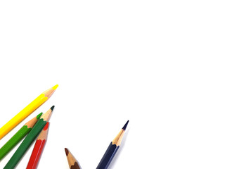 Color pencils on white background, copy space