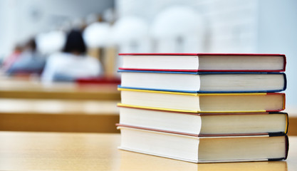 Books lying on the table in the public library