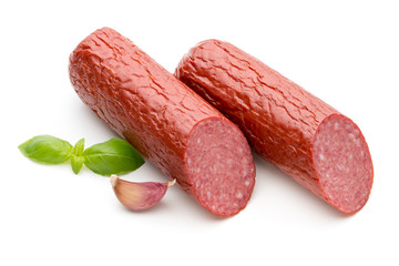 Salami smoked sausage, basil leaves on white background cutout.