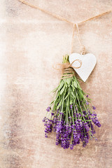 Lavender flowers, bouquet on rustic background, overhead.