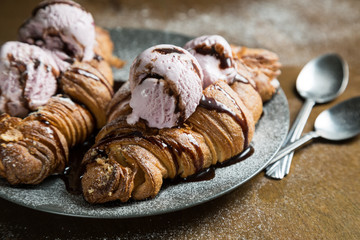 Ice cream balls in a croissant