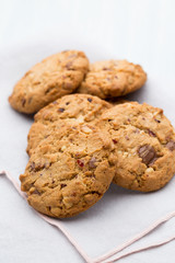 Chocolate oatmeal cookies on the  wooden background.