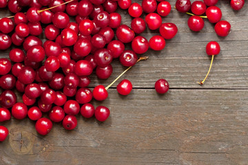 Fresh red cherry on  dark background. Healthy food concept
